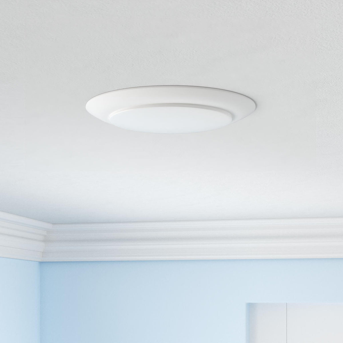 Parmida LED disk light in metal finish showcases a slim design for modern rooms.