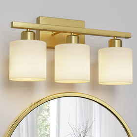 PARTPHONER 3-light brushed-gold bathroom fixture brightens the vanity area