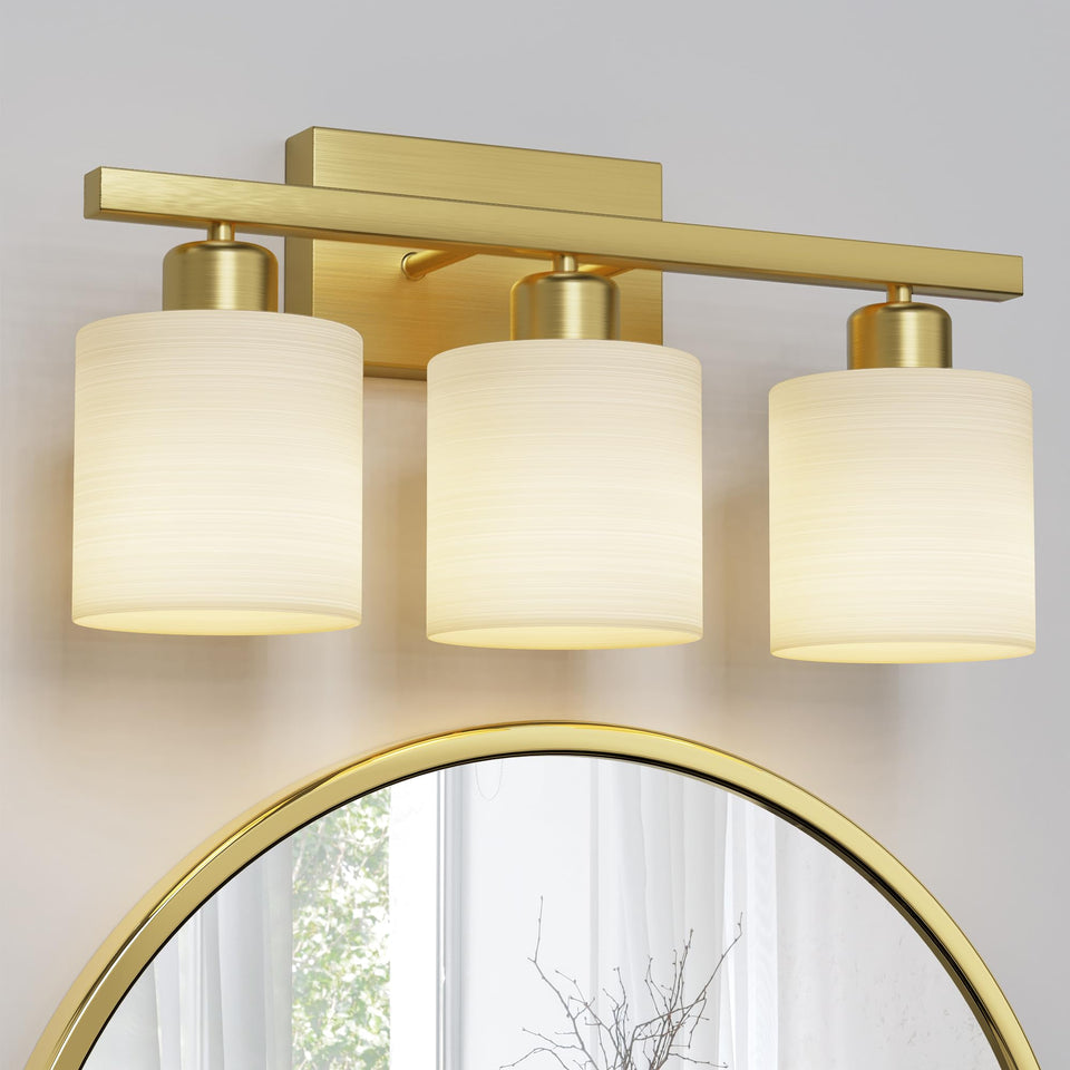 PARTPHONER 3-light brushed-gold bathroom fixture brightens the vanity area