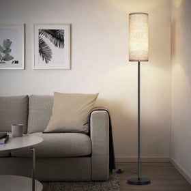 PARTPHONER floor lamp beside sofa provides ambient light