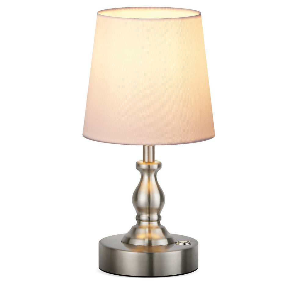 PARTPHONER mini cordless LED table lamp on nightstand with warm glow.