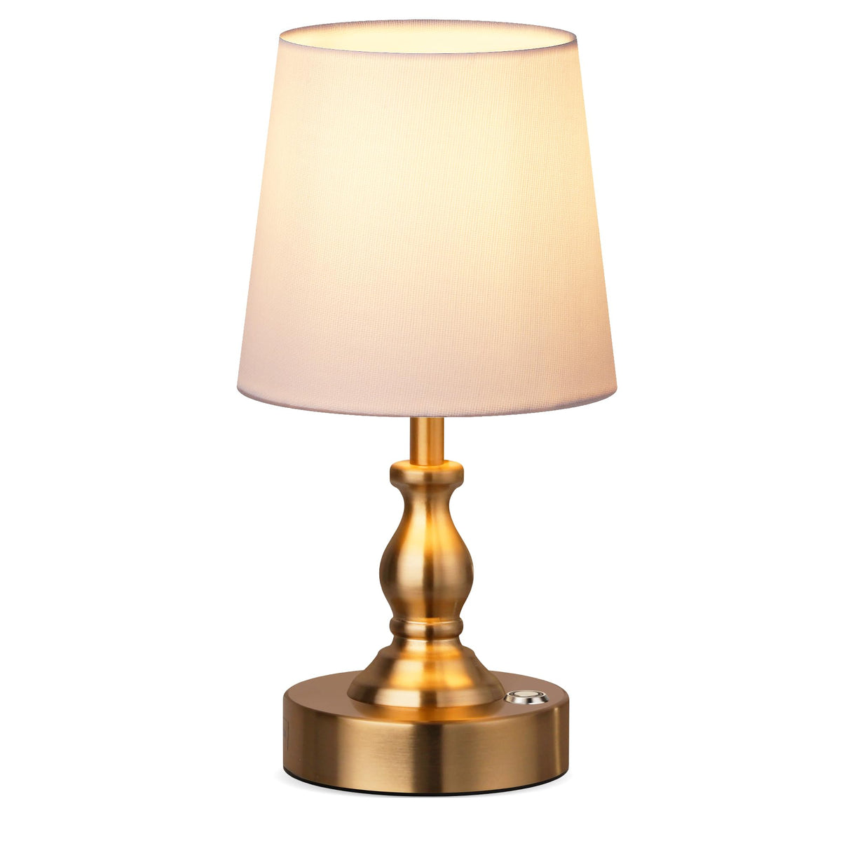 PARTPHONER Mini cordless table lamp in antique brass on a bedside table offering warm, diffuse light.