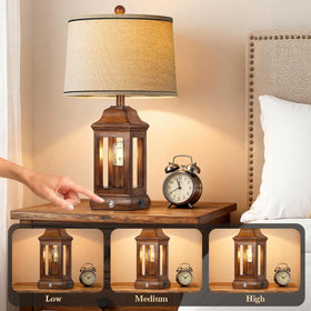 Partphoner bedside lamp USB ports keep devices charged.