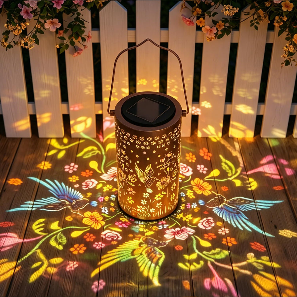 PASUTO colorful solar lantern with hummingbird openwork glows at night for garden decor.