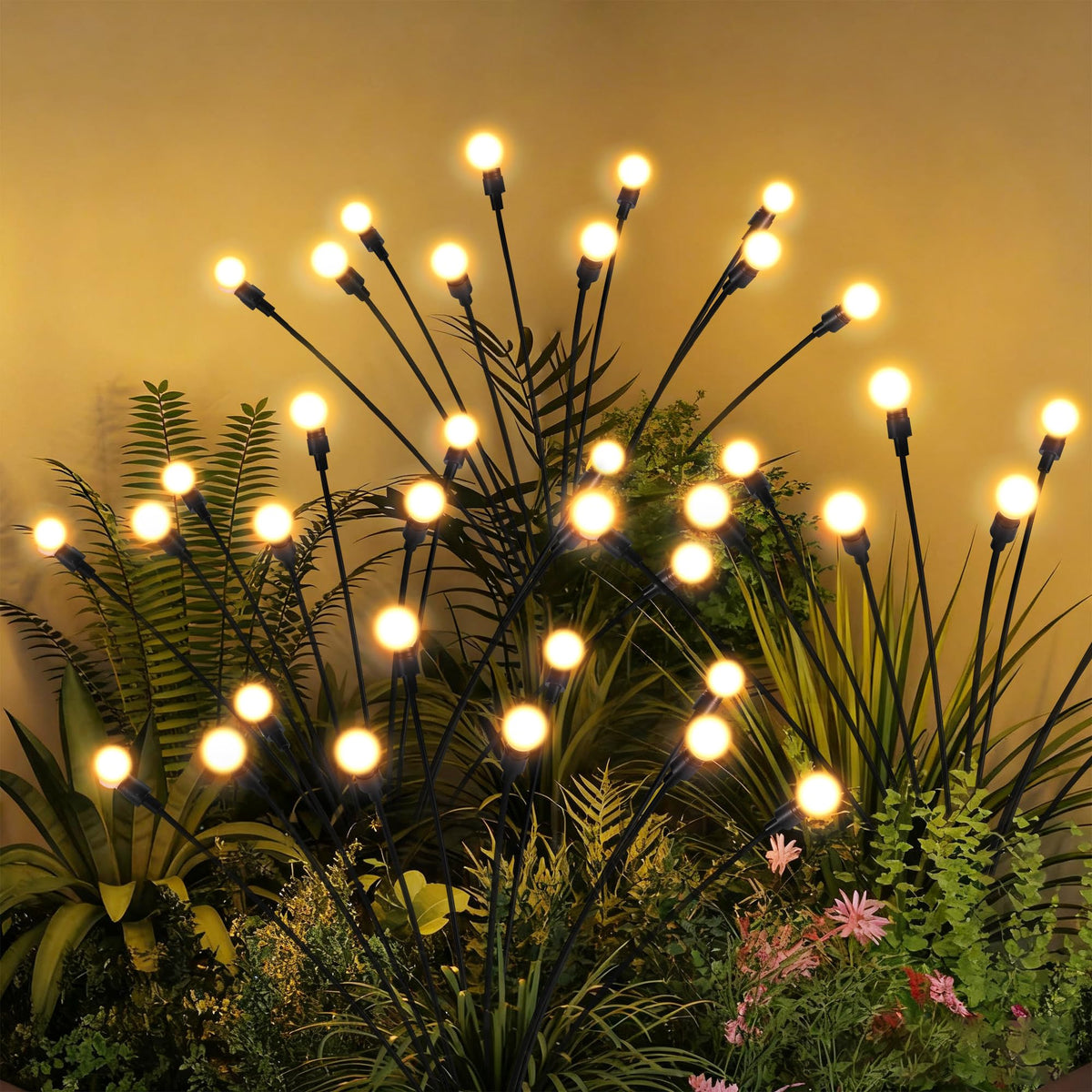 PATIOPIA Solar Garden Lights main view showing warm firefly glow for outdoor ambiance.