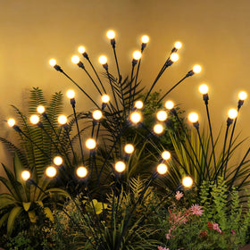 PATIOPIA Solar Garden Lights main view showing warm firefly glow for outdoor ambiance.