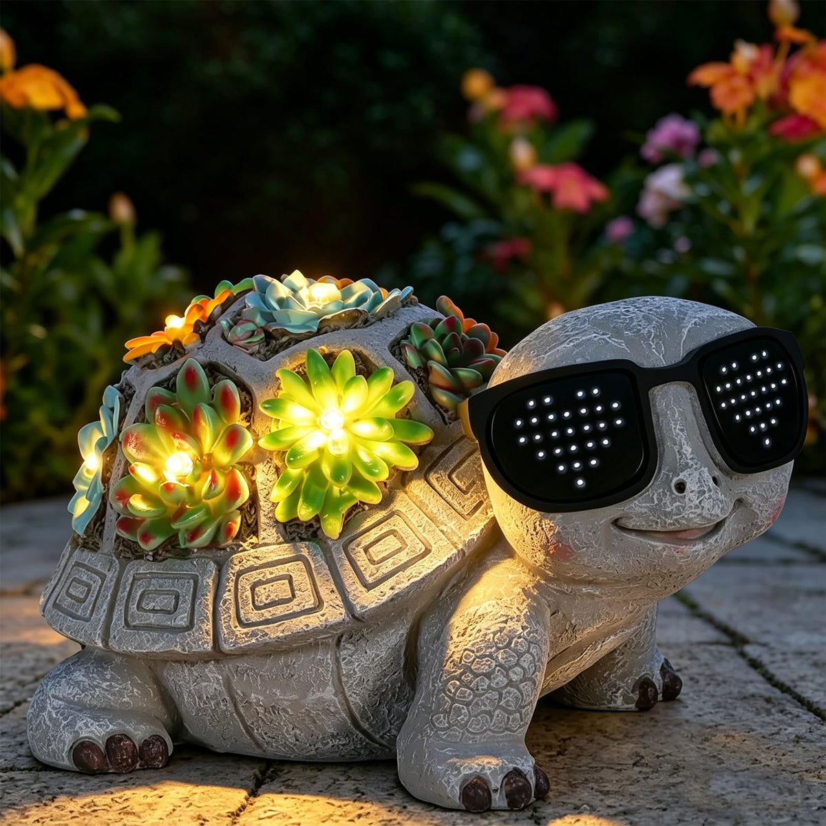Pawatee solar garden turtle statue with sunglasses adds playful lighting at dusk
