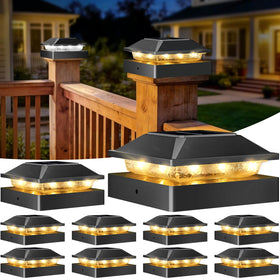 Peasur 4x4 post-cap light warm white illuminates walkways at night