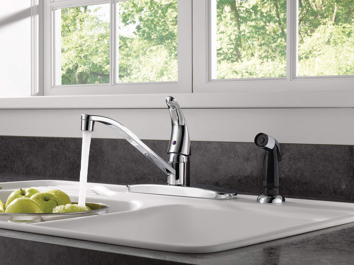 Peerless chrome side sprayer with retractable hose for quick mess cleanup.