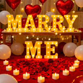 Peledic Marry Me letter sign lights up for a dramatic proposal ambiance.