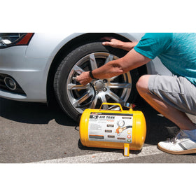 Performance Tool W10005 durable air hose connected to standard air source.