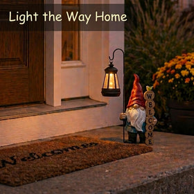 PETAFLOP outdoor gnome in yard adds charm and gentle glow after sunset.