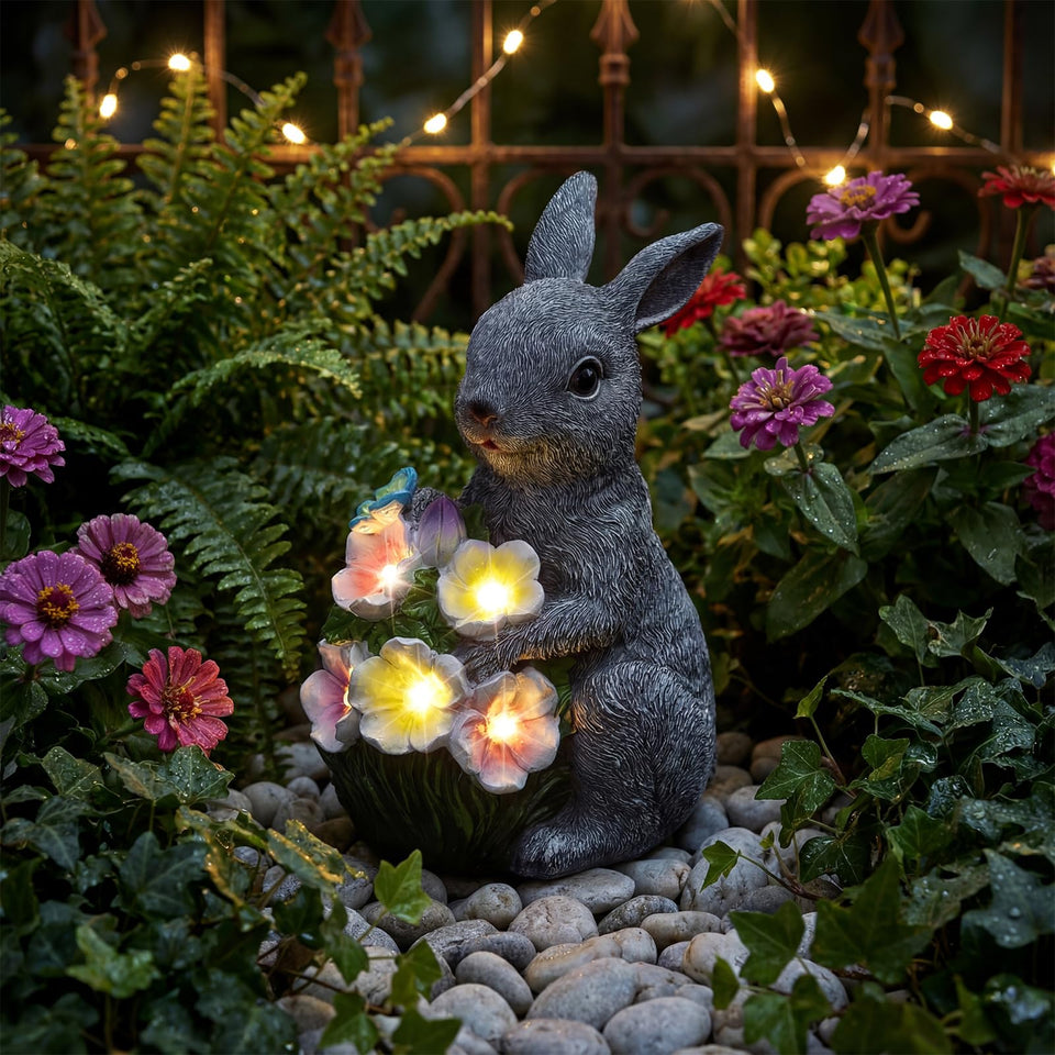 PETAFLOP solar rabbit bouquet glow illuminates garden paths at dusk.