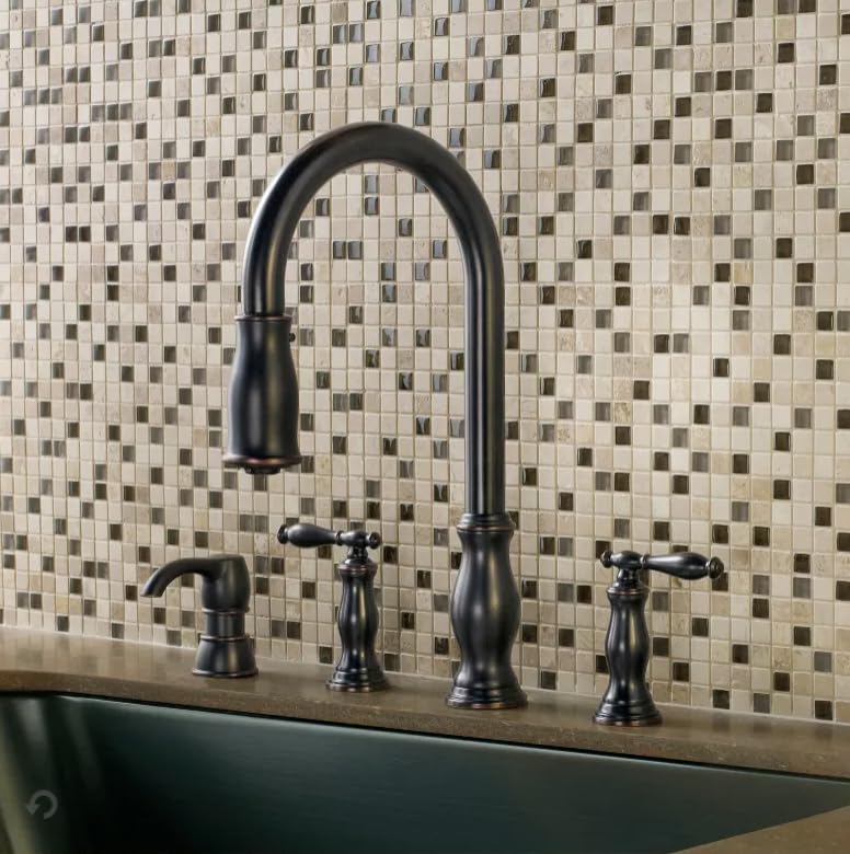 Pfister Hanover soap dispenser for a clutter-free sink area.