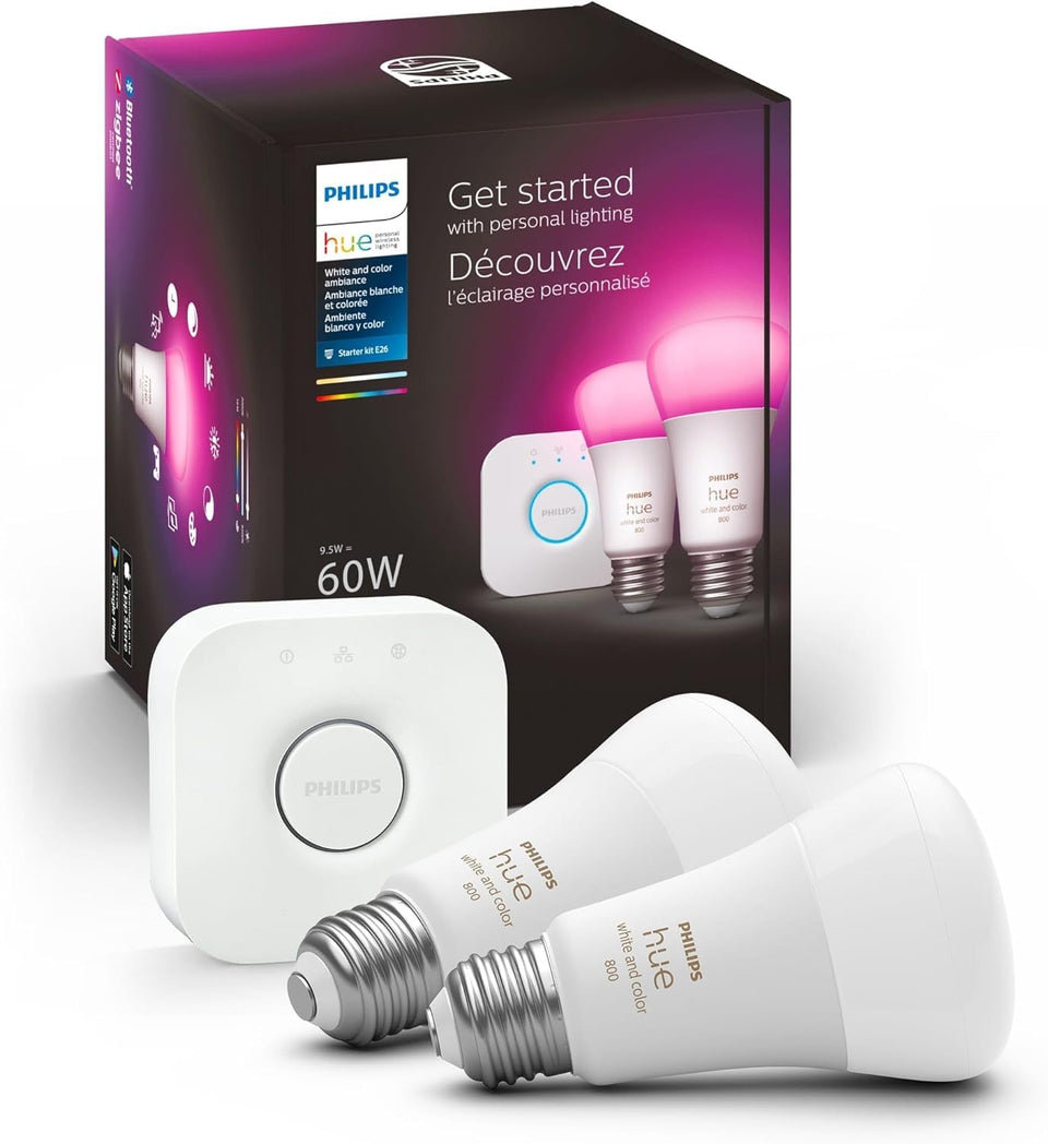 Philips Hue Bridge with two bulbs powering a smart setup in a living room