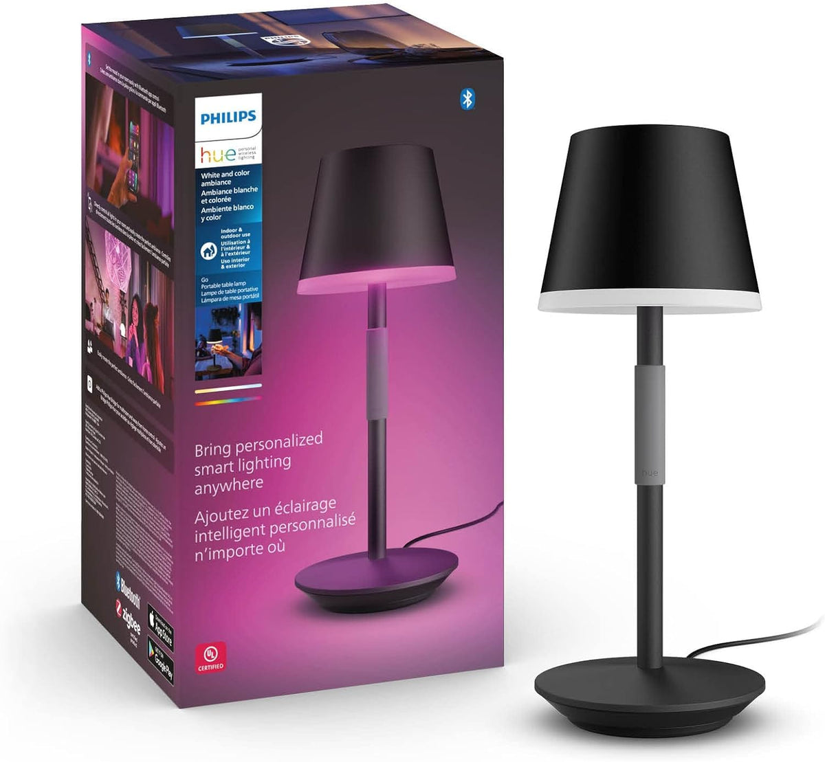 Philips Hue Go portable lamp in black on a table for versatile indoor lighting