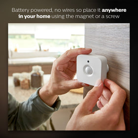 Philips Hue Motion Sensor mounted with magnetic mount for flexible placement
