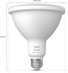 Philips Hue garden illumination highlighting landscaping with color.