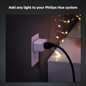 Philips Hue Smart Plug compact design fits outlets without blocking others.