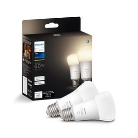 Philips Hue soft warm white bulb casting inviting living room light.