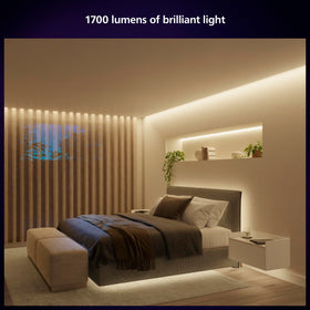 Philips Hue Solo lightstrip along stairs providing warm guiding illumination.