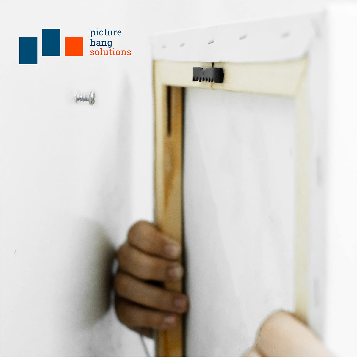 Picture Hang Solutions heavy-duty sawtooth hangers ready for larger frames.