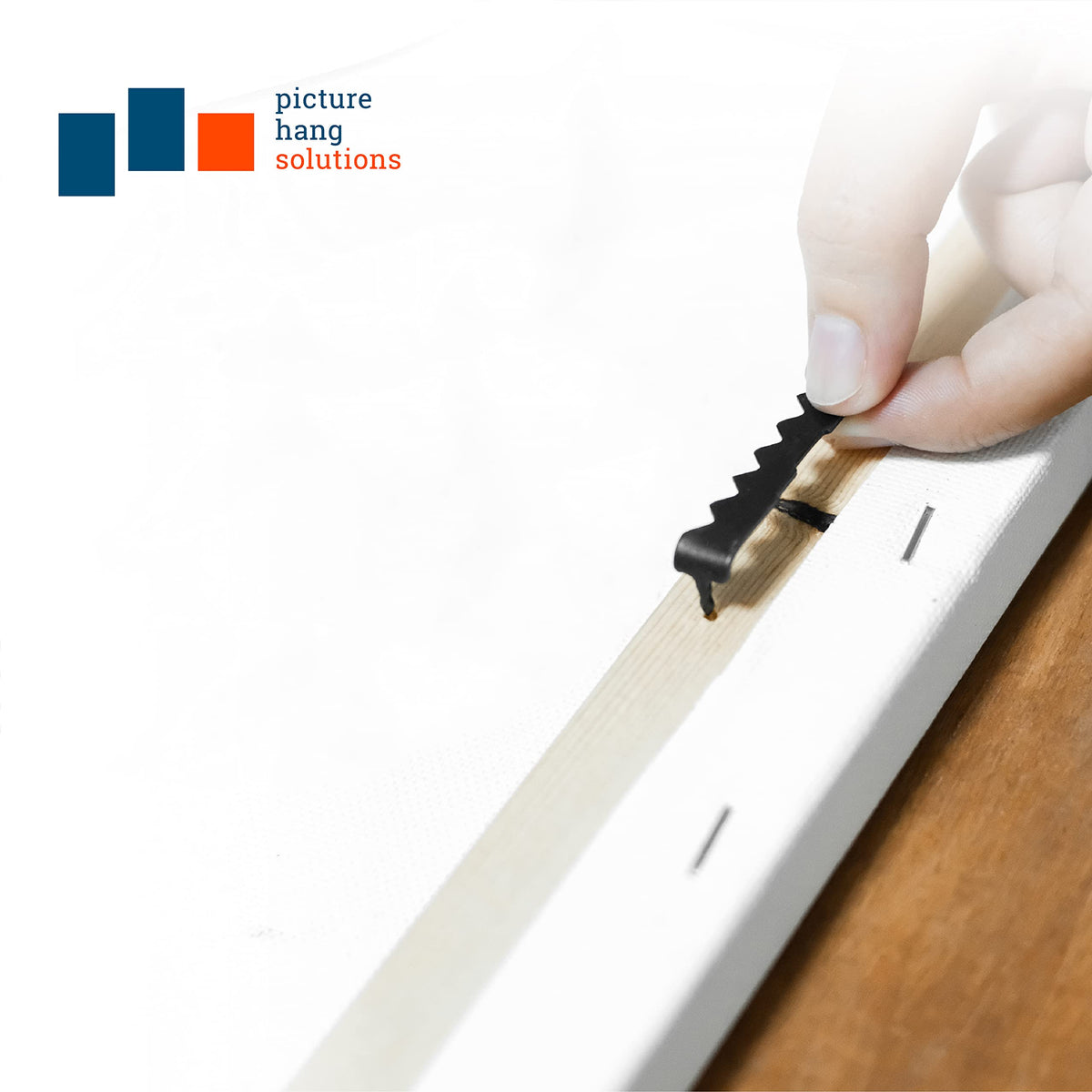Picture Hang Solutions large-frames-ready hangers for gallery displays.
