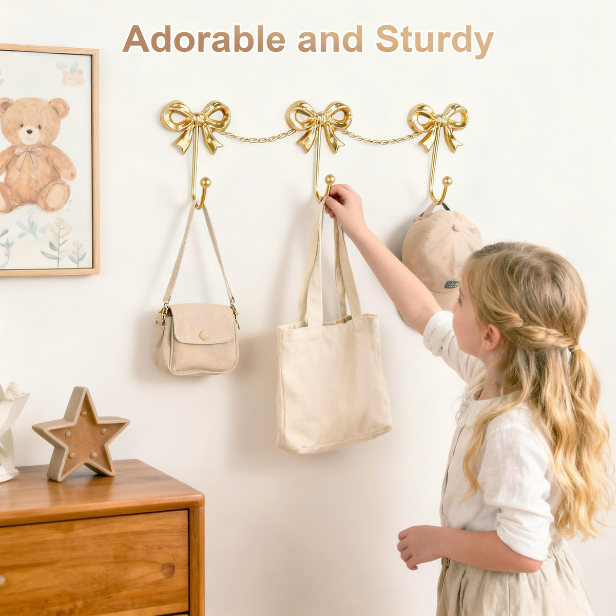 Pipigaty gold bow wall hanger; sturdy for towels and robes.
