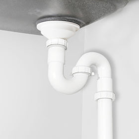 PlumbCraft Waxman female J-bend component for versatile sink drainage options.
