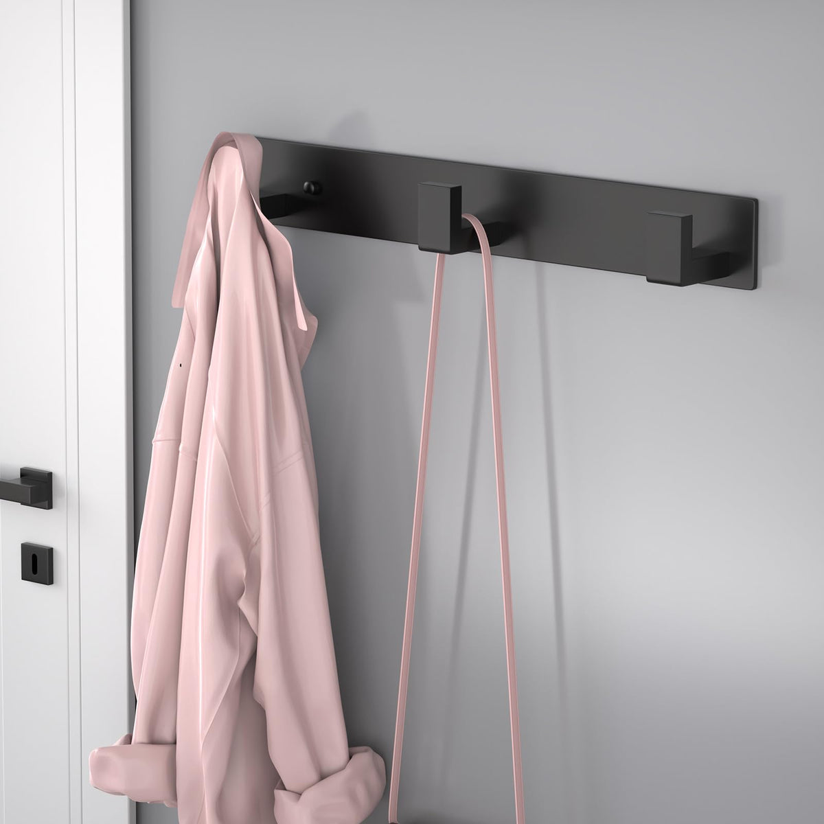 PMMASTO wall-mounted coat rack installed on wall with three hooks