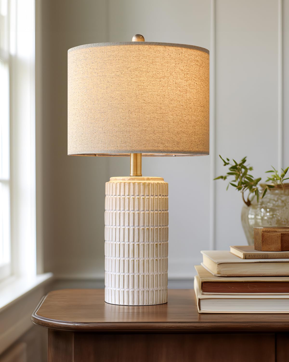 PoKat lamp on a console table adds hallway style.