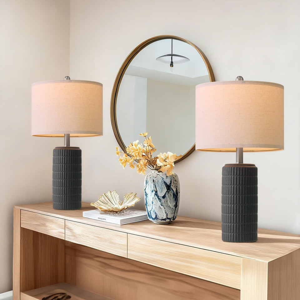 Pokat 23-inch matte-textured ceramic lamp set showcased on a bedside nightstand.