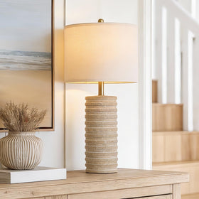 PoKat bedside lamp beige rustic finish complements vintage decor.