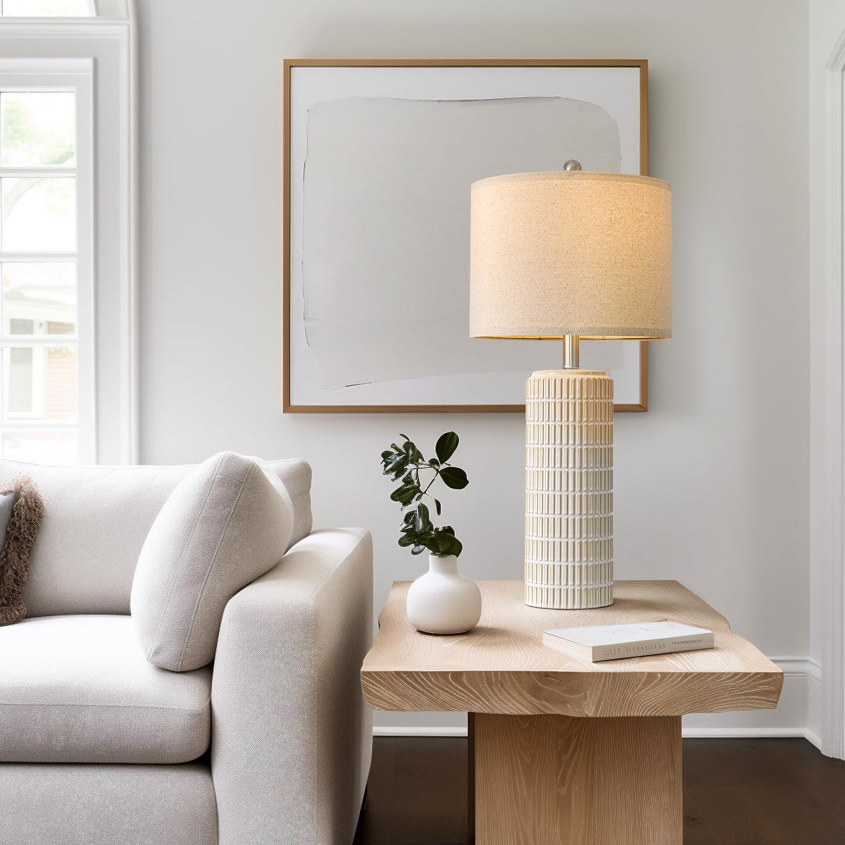 Bedroom bedside PoKat lamp offers balanced task lighting.