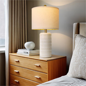 PoKat end table lamp set illuminating a living room corner