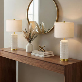 PoKat gold-base table lamp pair adding modern elegance to bedrooms