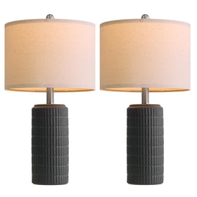Pokat lamps positioned on a console table for stylish room framing.