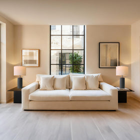 Pokat living room end table pair enhancing cozy seating area.