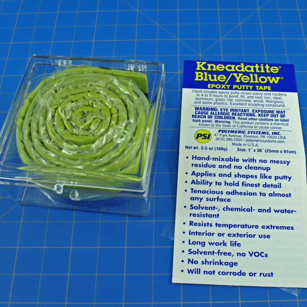 Kneadatite Blue/Yellow epoxy putty tape closeup texture showing fine-detail hold