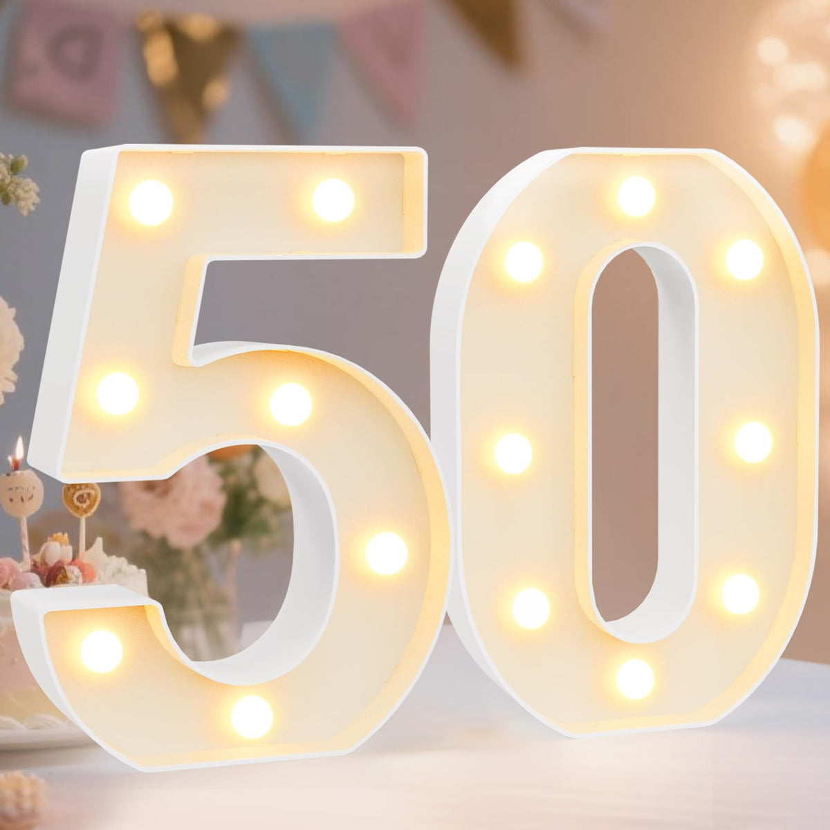 Pooqla 50-number light table decor for a bright 50th celebration