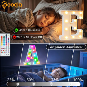 Pooqla colorful LED letters brighten a bedroom as a friendly night light.