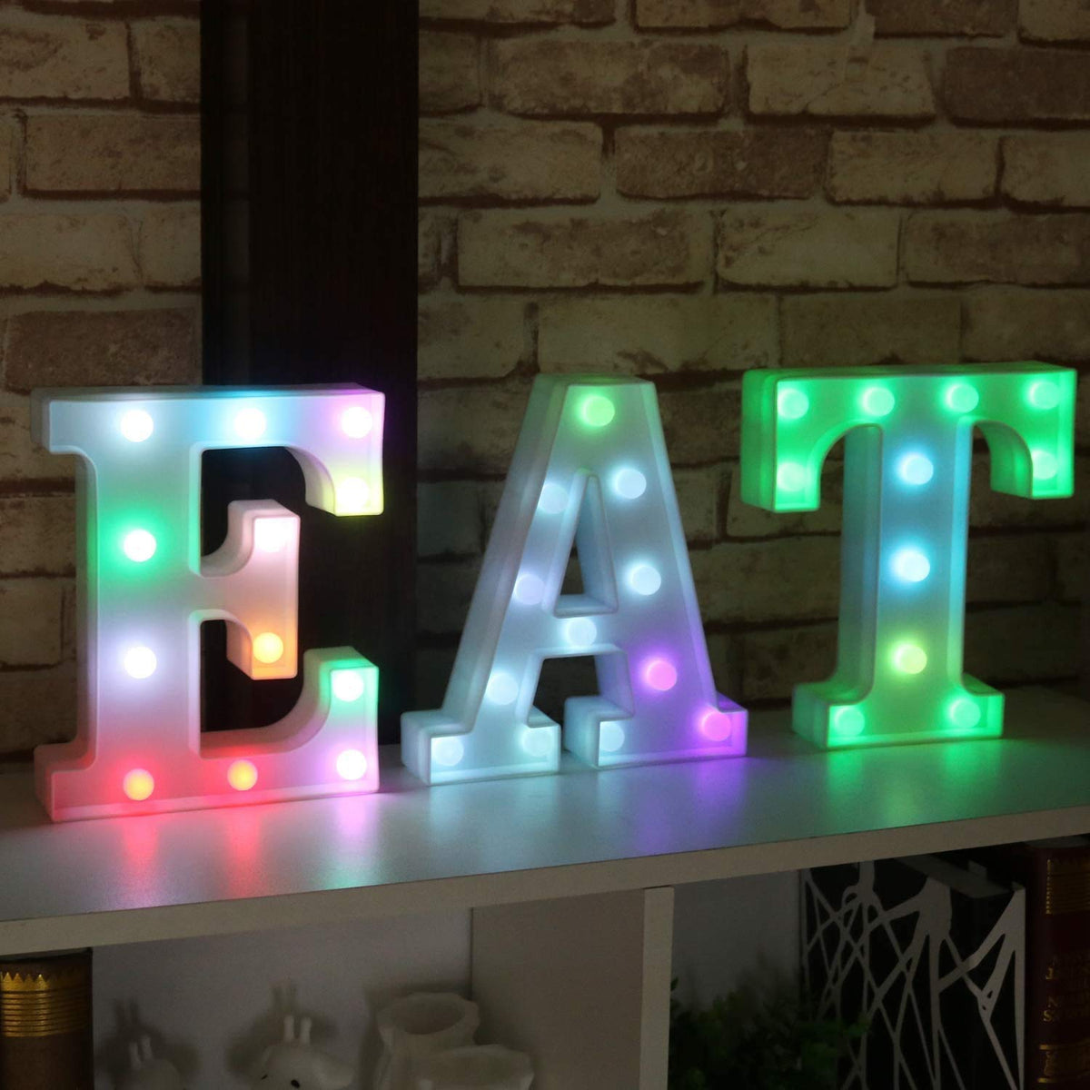 Pooqla remote-controlled letter light for stand-alone display or wall mounting