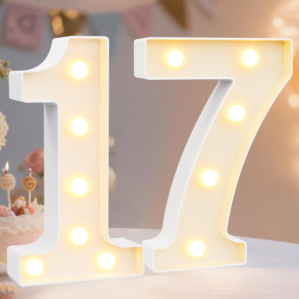 Pooqla light up number 1 on table with warm glow for party centerpiece.