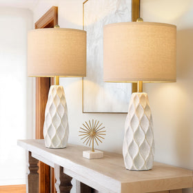 PORTRES 27.5-inch ceramic table lamp pair on a nightstand for cozy reading.