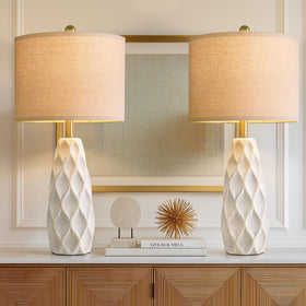PORTRES living room setup with two boho-modern lamps.