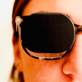 Precision Vision Optishield hands free occluder attachment on spectacles