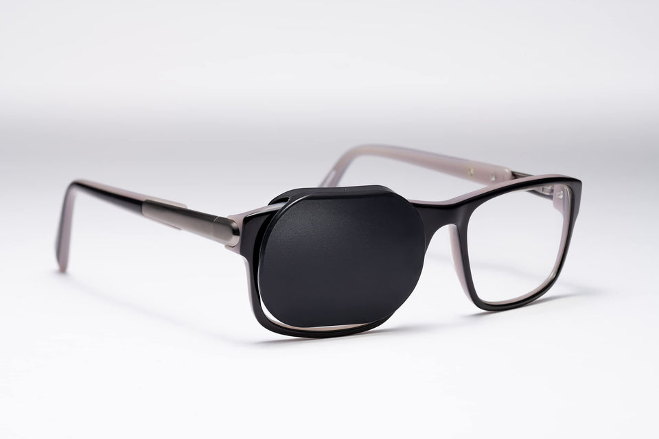 Precision Vision Optishield silicone occluder on glasses for secure occlusion