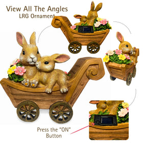 PRETMANNS solar bunny garden decor adds whimsical presence to flower beds.