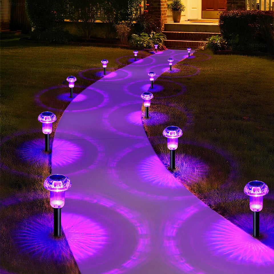 Priddop purple acrylic mushroom solar light illuminating a garden path