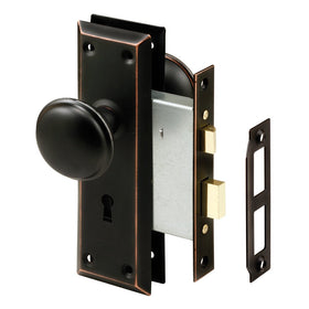Prime-Line E 2495 bronze knob close-up for durable interior door hardware upgrade.